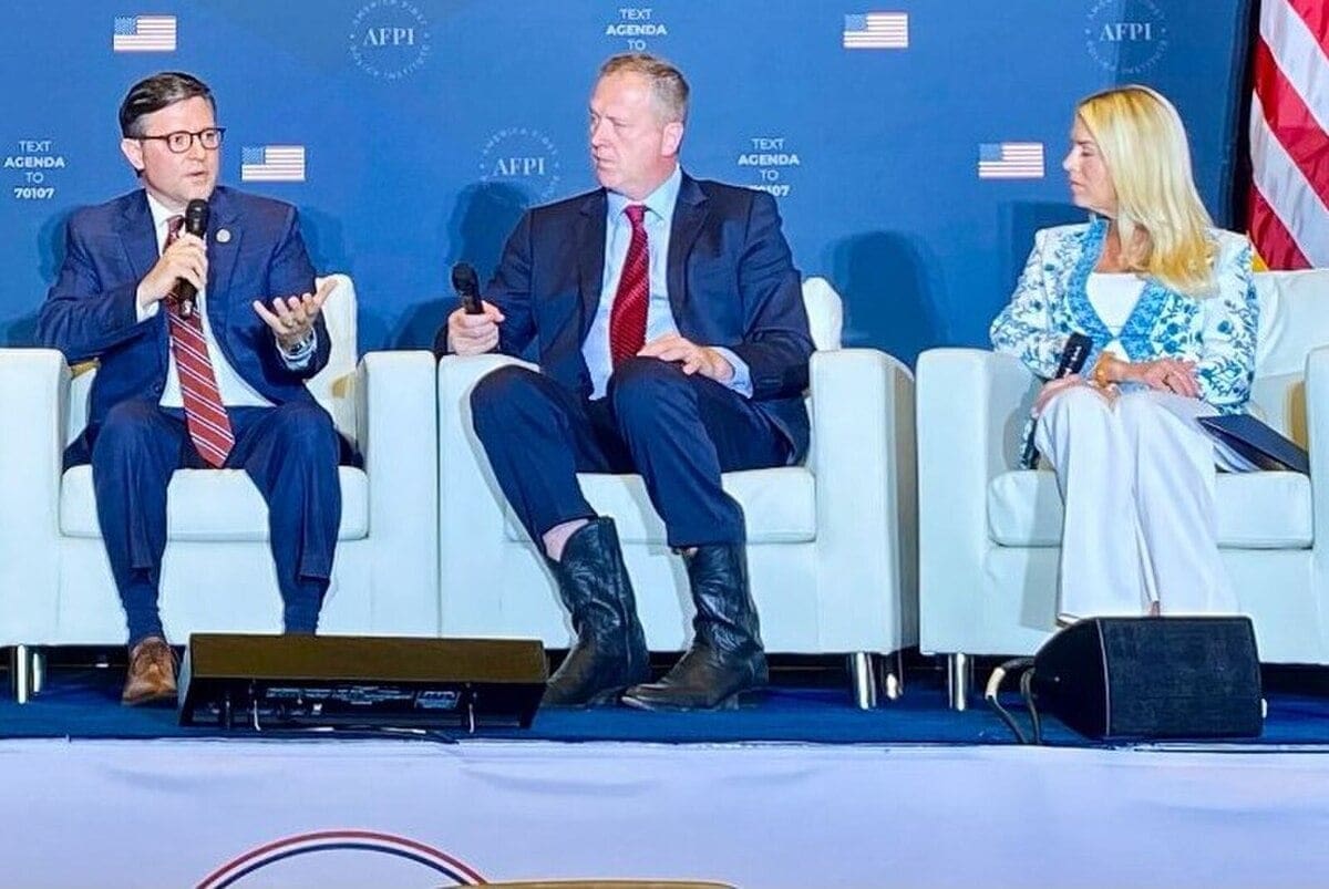 Pam Bondi and Mike Johnson in a panel at an event held by America First Policy Institute 