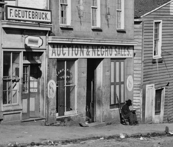 Systemic racism A slave market in 1864